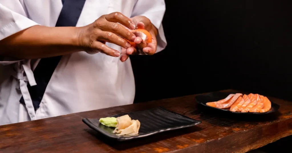 寿司職人業界への転職の壁｜握り寿司を作る職人の手元、技術習得と修行の難しさを象徴