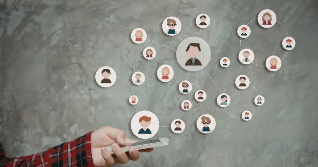 スマートフォンとSNSネットワークを表すアイコンのイラスト。就活におけるインスタグラムの問い合わせ方法や適切な利用シーンについて説明するセクションに関連。