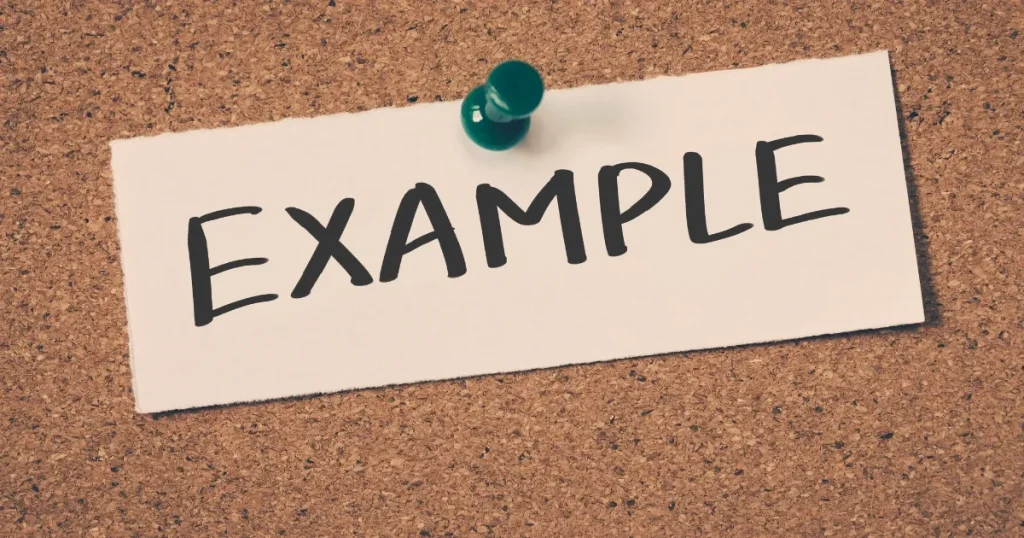 コルクボードにピンで留められた「EXAMPLE」のメモで、未経験・転職向けの宅建士の志望動機例文をイメージした画像